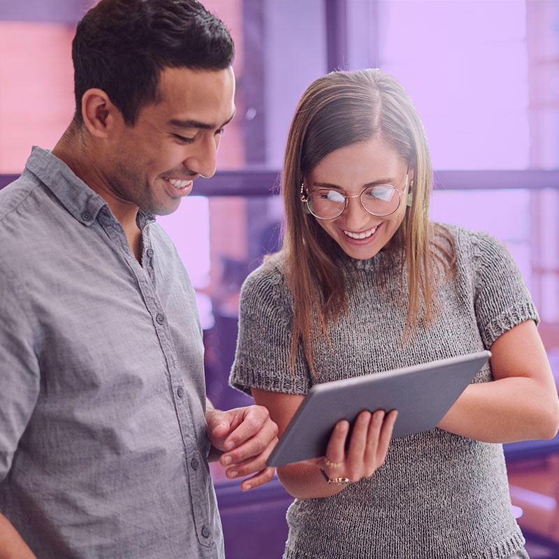 Colleagues enjoying their HR software