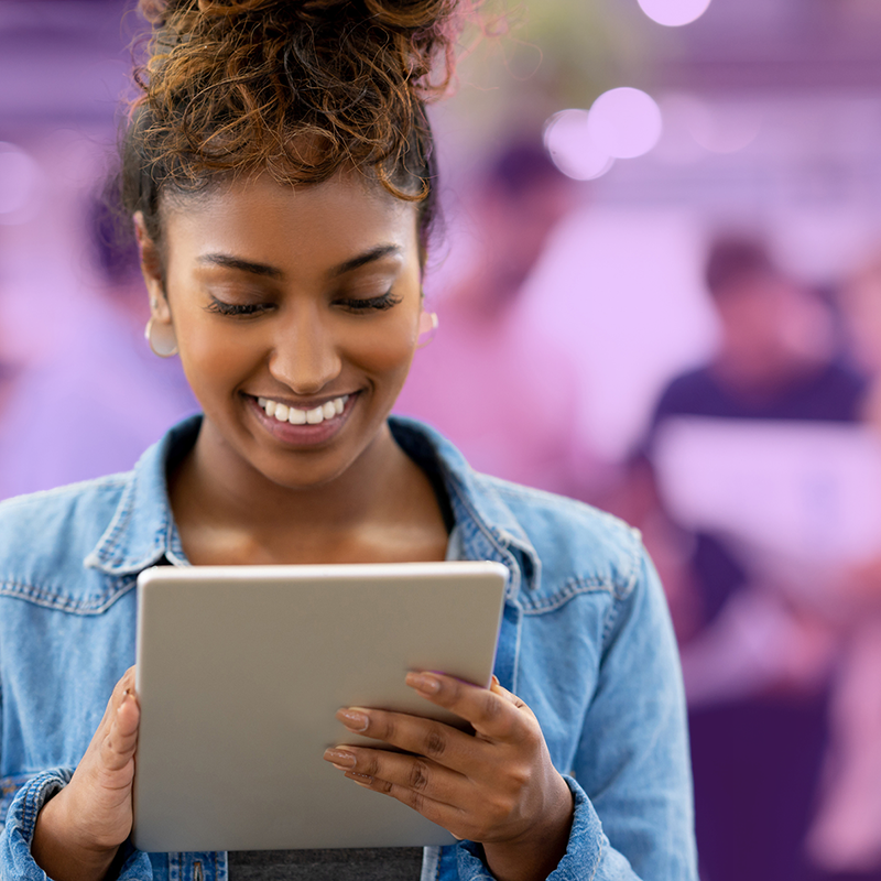 HR person reviewing tablet