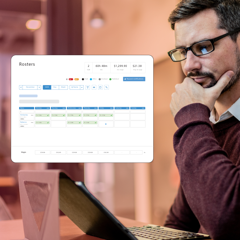 Businessman using rostering software