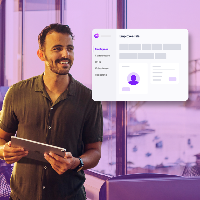 Man using employee database software on a tablet