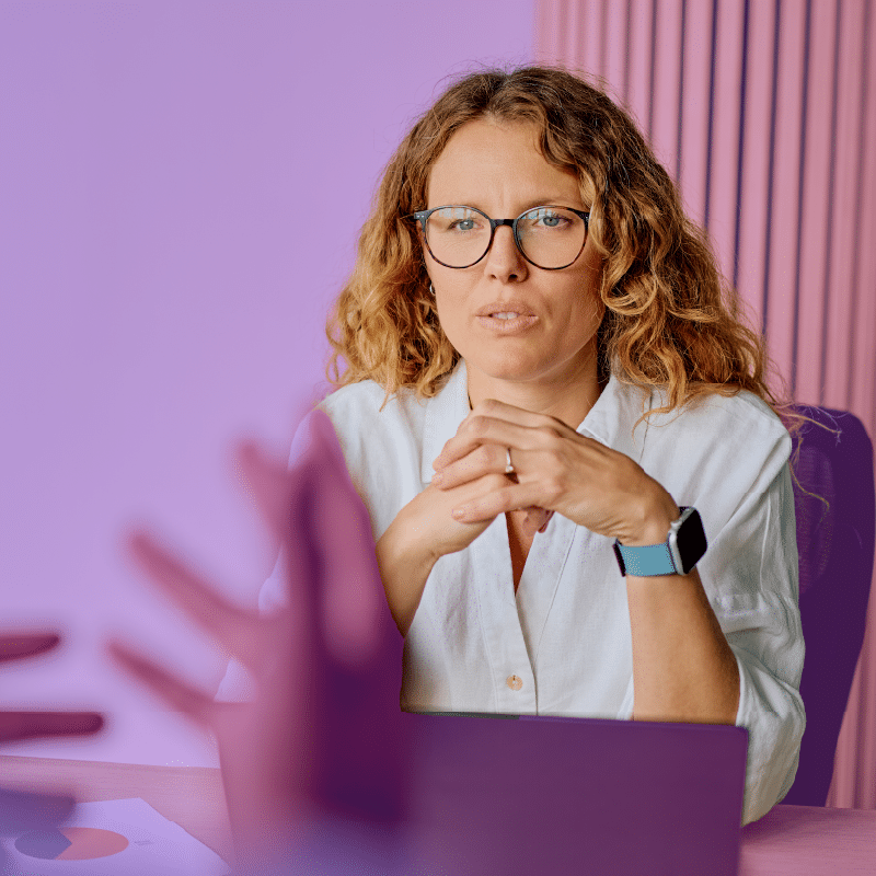 HR manager conducting employee offboarding meeting
