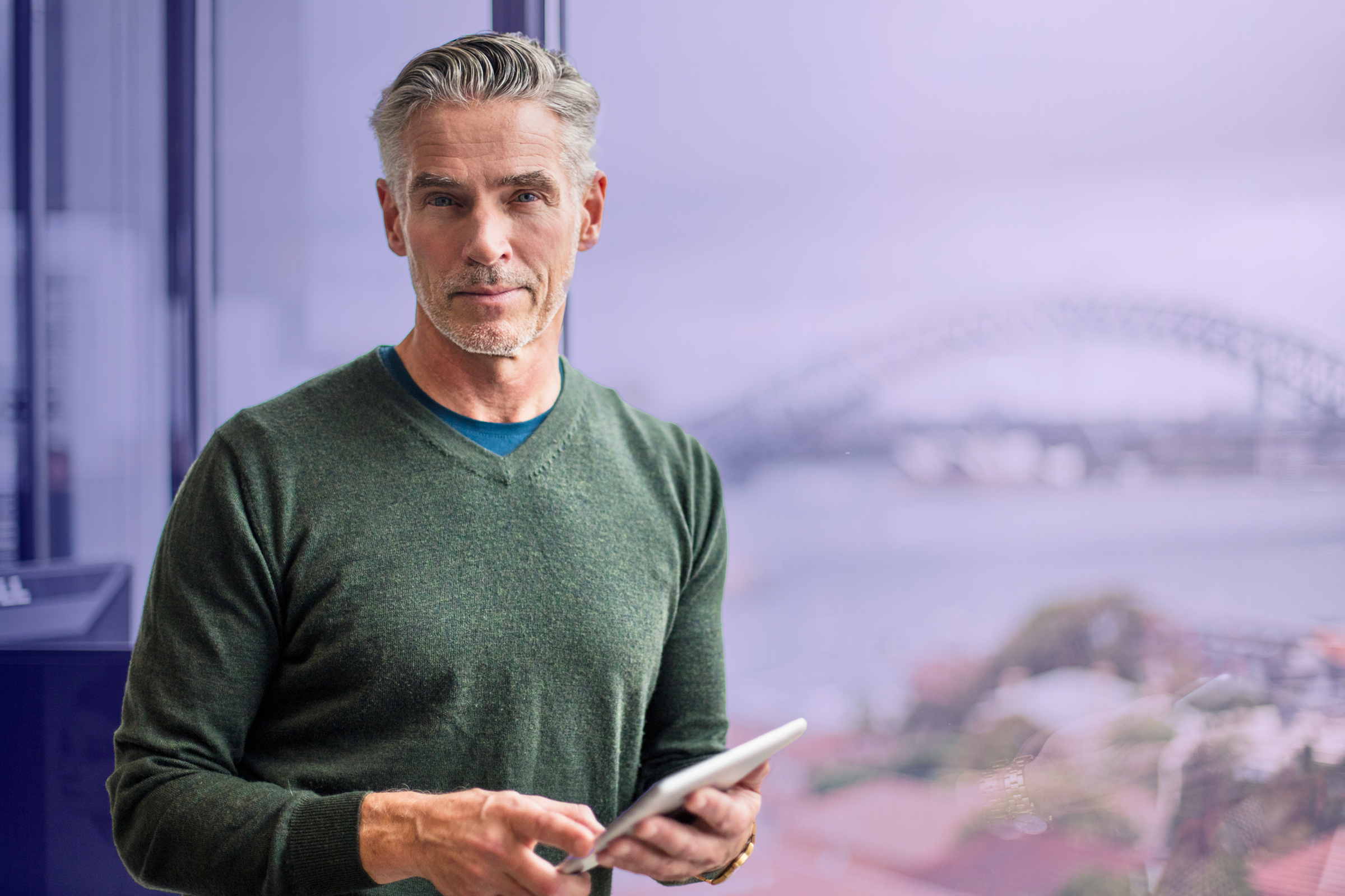 Business owner in Sydney office using workforce onboarding software