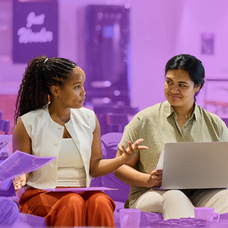Colleagues collaborating in a modern office setting