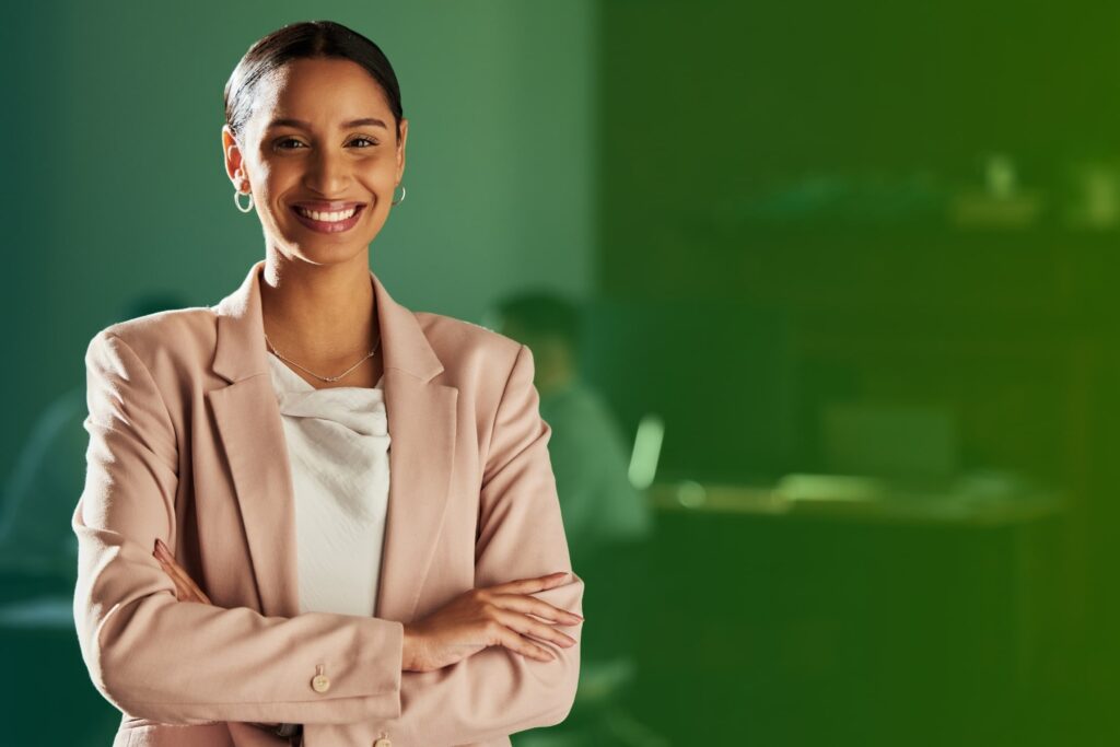 Smiling woman with arms folded
