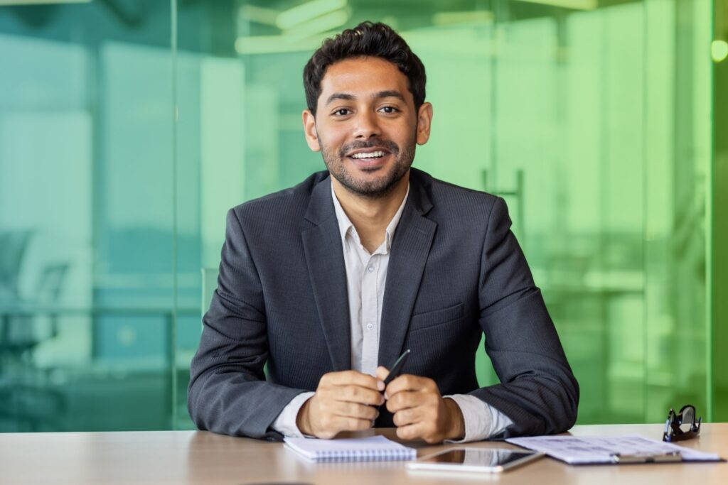 Businessman with a notebook in front of him