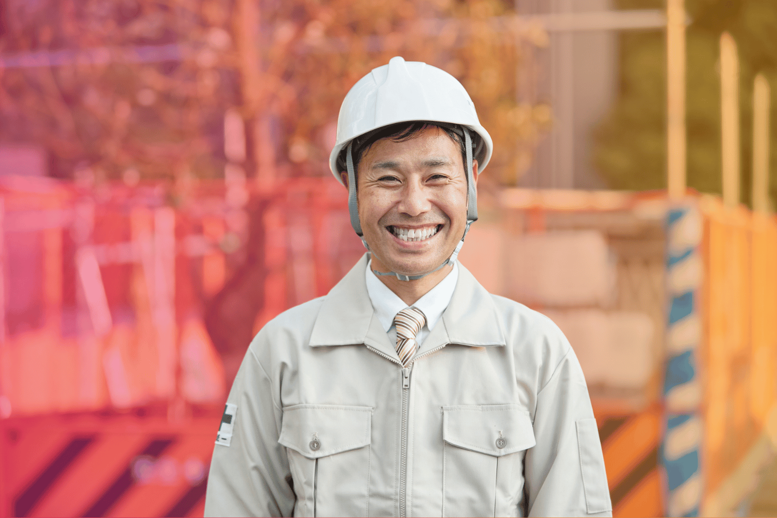 Smiling man wearing a hard hat