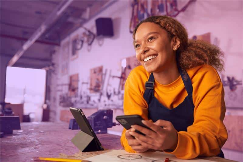 Smiling woman running a family business